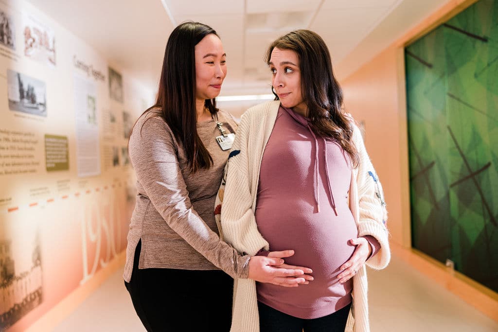 Image from Salem Health brand campaign; pregnant mother with doctor